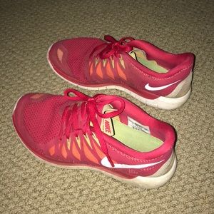 Nike red tennis shoes